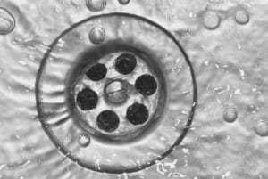 Broken underground pipe causes Slow draining water down plughole 