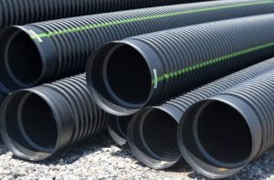 Plastic drain pipes to replace broken underground drains 