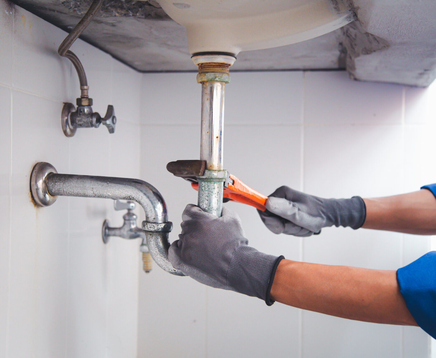 Man repairing sink